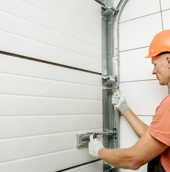 worker-is-installing-lift-gates-garage_191163-1755